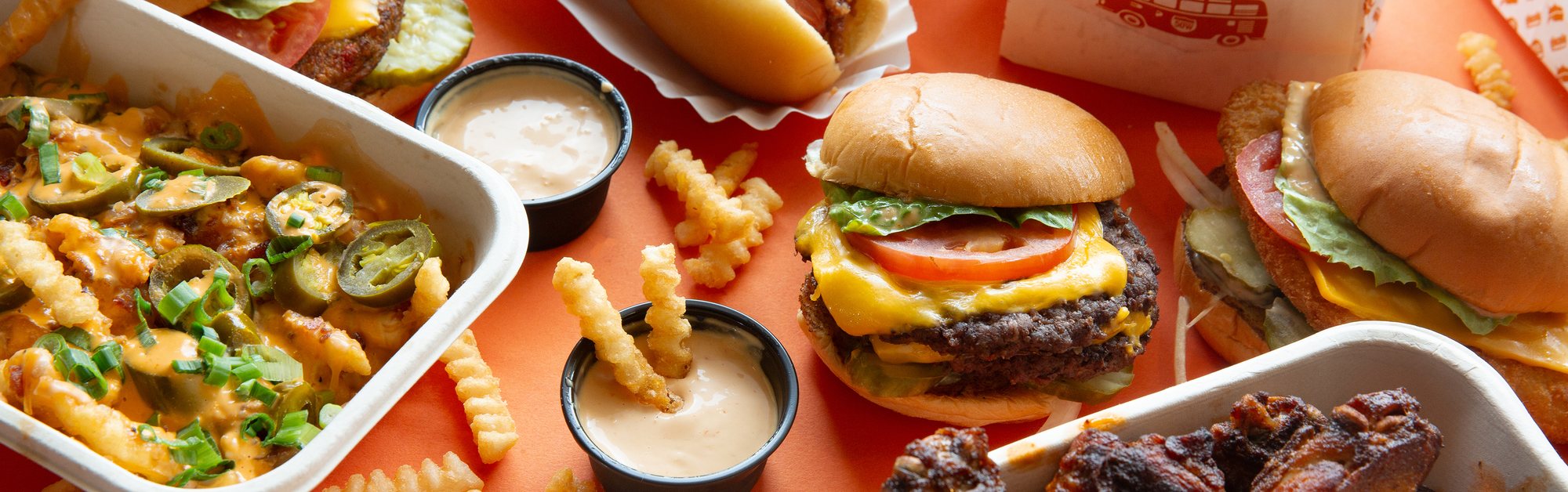 Fifty West burgers, crinkle fries, loaded fries, wings and sauces